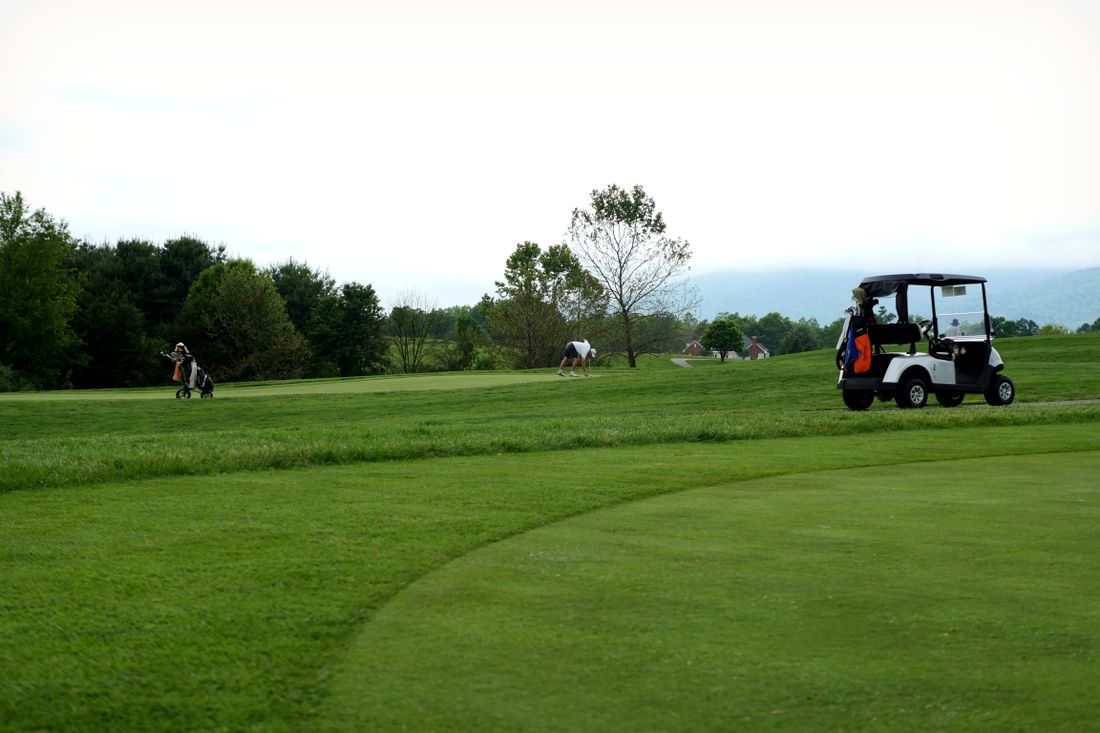 Fairway and golf cart on a Virginia course